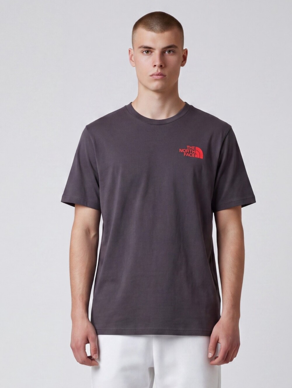 The North Face Men’s Short Sleeve Tee — Navy Blue with Red Logo